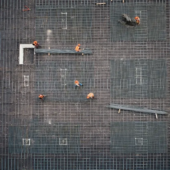 workers-building-metal-installation-on-building-just-transition