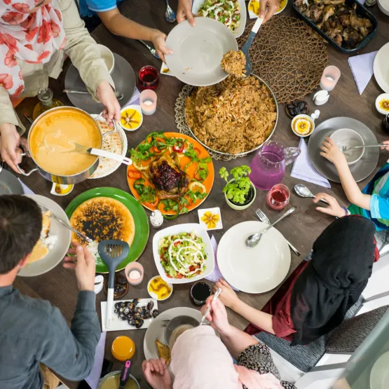 Family-and-friends-eating-dinner-together