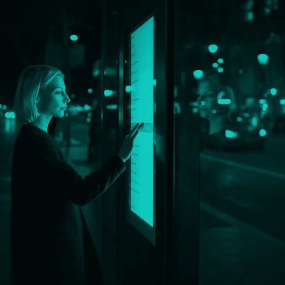Digital-inclusion-Woman-touching-screen-scaled