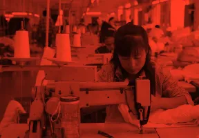 woman_sewing_in_factory_red
