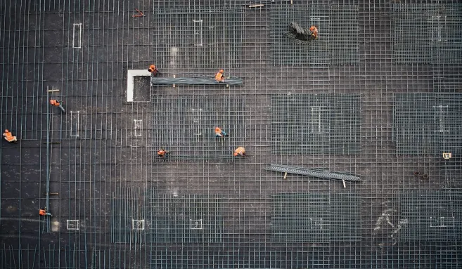 workers-building-metal-installation-on-building-just-transition