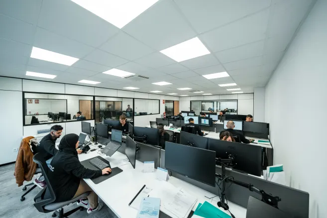 A group of workers in a room