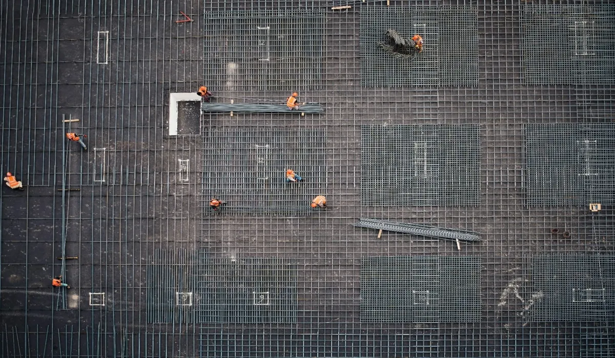 workers-building-metal-installation-on-building-just-transition